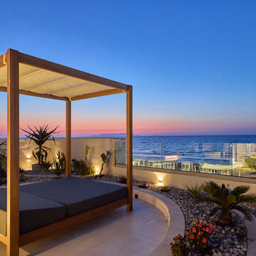 Paralos Kosta Alimia gazebo at a terrace with view of the sea during the sunset