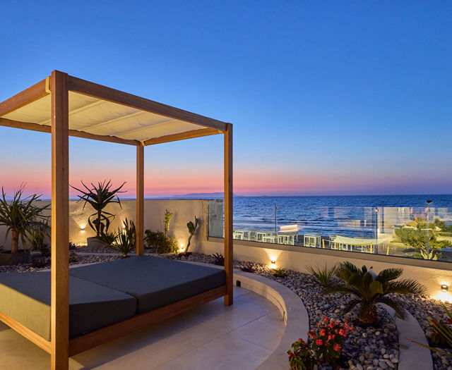 Paralos Kosta Alimia gazebo at a terrace with view of the sea during the sunset