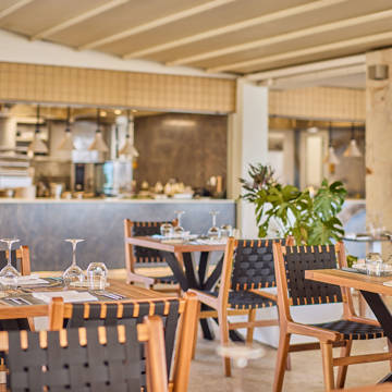 Paralos Kosta Alimia Steakhouse decorated tables and chairs