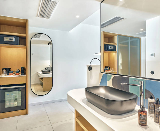 Paralos Kosta Alimia Junior Suite Sea View washbasin, two mirrors and amenities