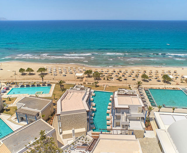 Paralos Kosta Alimia landscape view of the hotel's pools, the beach and the sea