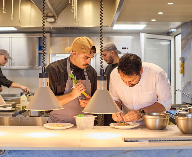 Paralos Kosta Alimia cooks preparing a gourmet dish